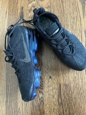 Nike VaporMax Flyknit Sneakers in Black with Blue Sole